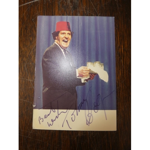 106 - A vintage autograph book containing an autographed picture of Tommy Cooper, Linda Lewis, Max Bygrave... 