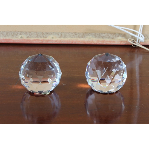 14 - Two Swarovski crystal Vitrail rainbow paperweights.