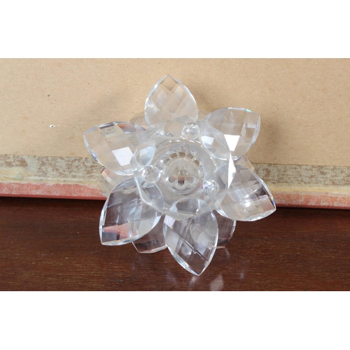 23 - A crystal lotus flower candleholder.