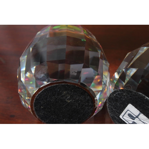 33 - Two stunning Swarovski crystal rainbow barrel volcano paperweights, measuring 7 1/2cm height.