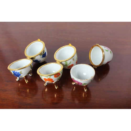 43 - Three ceramic egg trinket boxes.