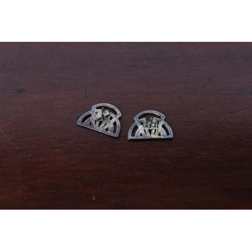 44 - A pair of vintage art deco style sterling silver earrings.