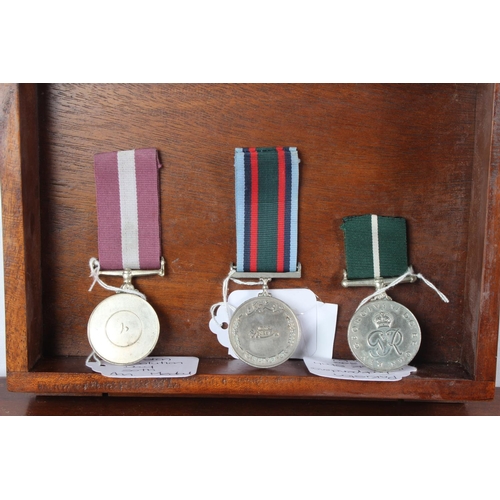 45 - A Pakistan Independence 'Feroze Shah FC358' military medal and two others.