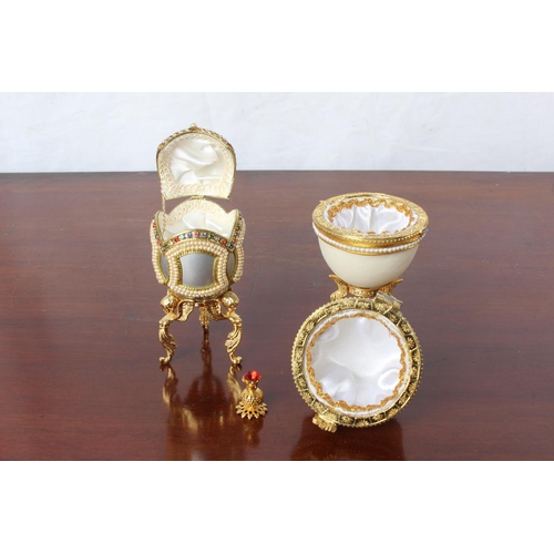 47 - Two Faberge style egg shaped trinket boxes (one a/f).