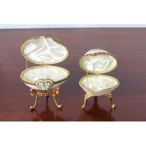 50 - Two Faberge style egg shaped trinket boxes.