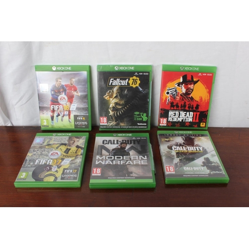 57 - A Logic 3 PC SprintPad game, model JT265 and six XBOX console games.