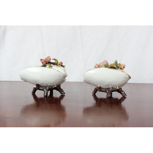 8 - A pair of Meissen Style shells with flowers (a/f).