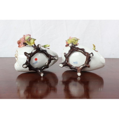 8 - A pair of Meissen Style shells with flowers (a/f).