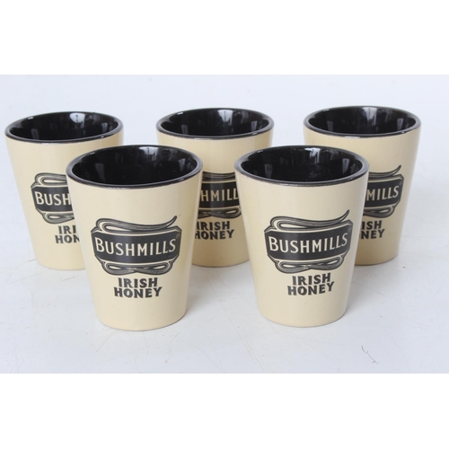 100 - Five Bushmills 'Irish Honey' ceramic shot glasses.