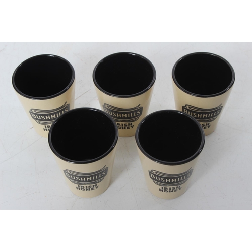 100 - Five Bushmills 'Irish Honey' ceramic shot glasses.