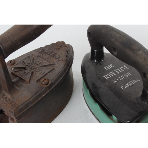 74 - An antique cast iron and another vintage iron 'The Rhythm'.