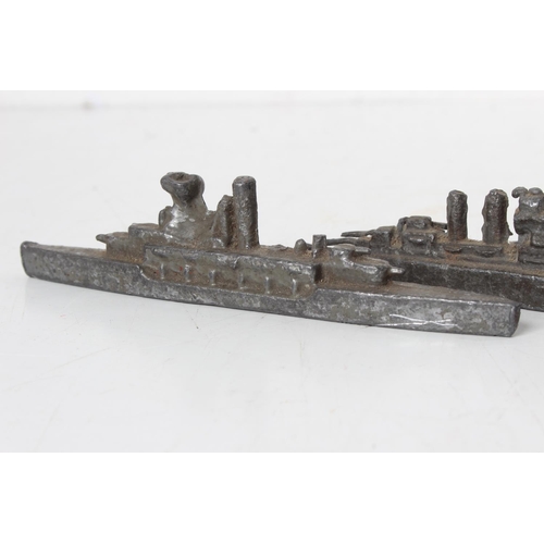 90 - A collection of four 1950s cast metal ships.