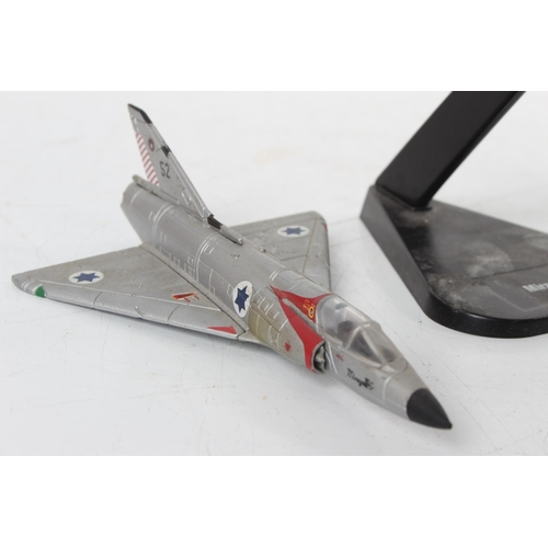 94 - Two diecast military planes on presentation stands 'Maisto Messerschmitt Me-109G' and 'Mirage III' a... 