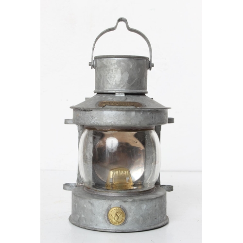 95 - A vintage 'Masthead' ships lantern, measuring 21cm tall.