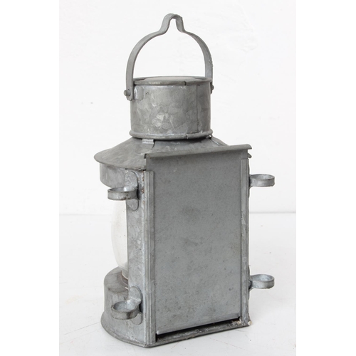 95 - A vintage 'Masthead' ships lantern, measuring 21cm tall.