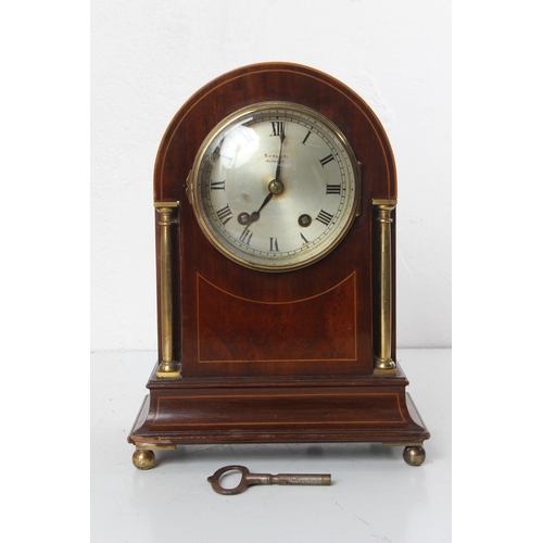 108 - A stunning antique/ Edwardian arch top mantle clock, with inlaid case, brass pillars & silvered dial... 