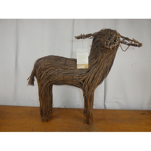 220 - A willow sheep sculpture. 19.5 x 17.5 inch