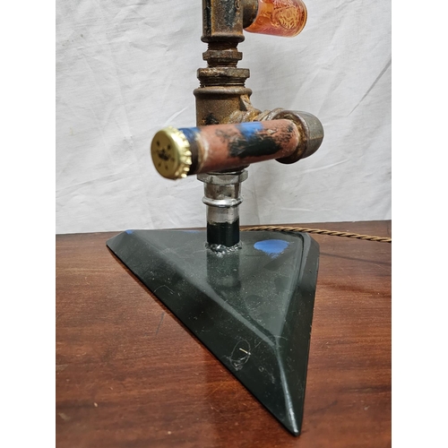 267 - An unusual handmade table lamp. 22.5 inch