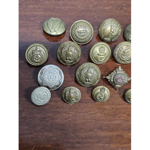 273 - A collection of various antique/ vintage military buttons.