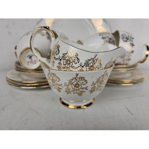 144 - A decorative vintage Gainsborough tea set.