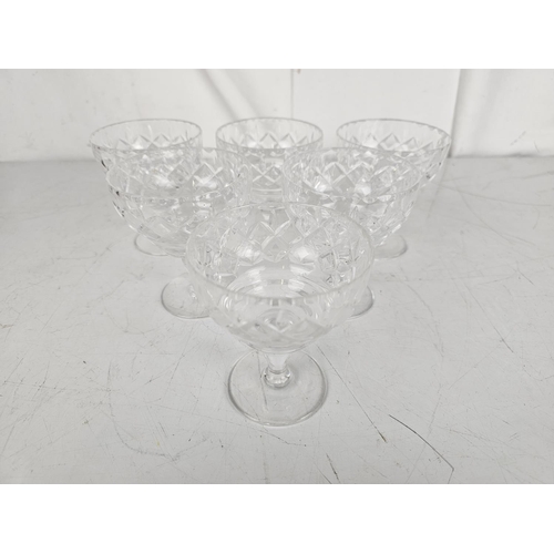 149 - A set of 6 crystal champagne saucers.