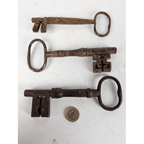 214 - A set of 3 large antique keys.