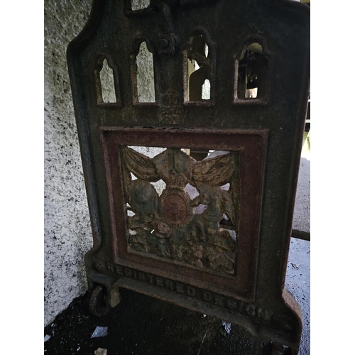 60 - An antique cast iron mangle, produced by Griffiths & Jones - Belfast, with decorative cast panels.