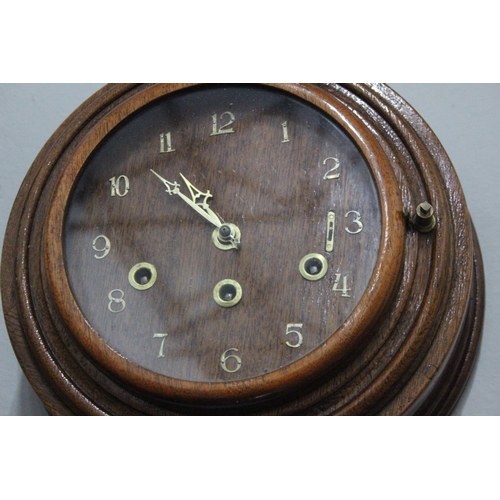 302 - An unusual antique wall clock. 12 x 12 inch