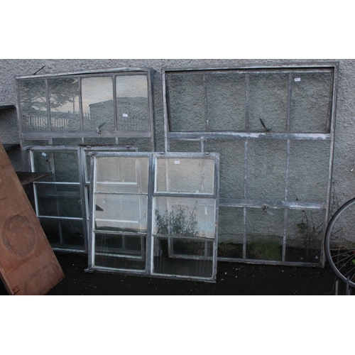 80 - 4 large antique factory windows with metal frames, in need of some restoration.