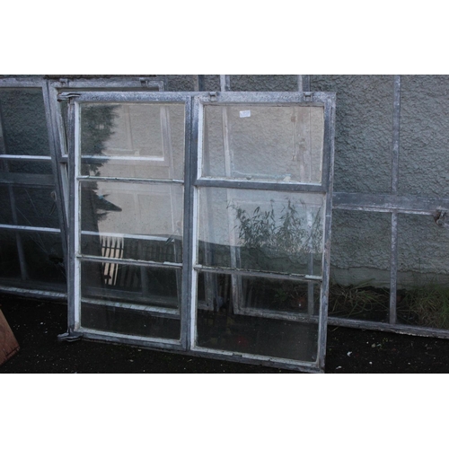 80 - 4 large antique factory windows with metal frames, in need of some restoration.