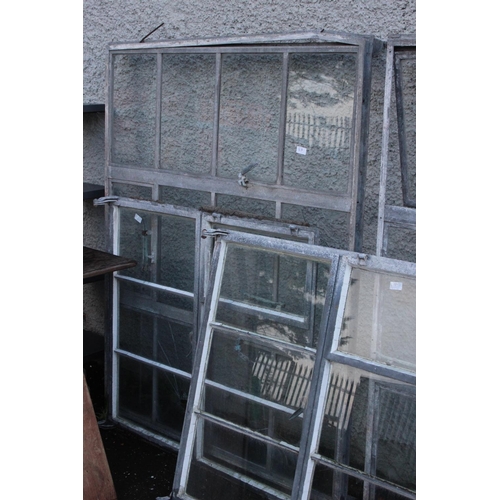 80 - 4 large antique factory windows with metal frames, in need of some restoration.