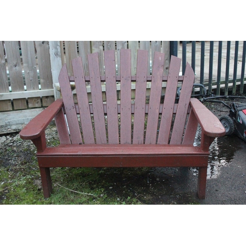 507 - A wooden garden bench.