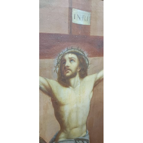 491 - A stunning antique painting depicting the Crucifixion of Christ. 36 x 49 inch