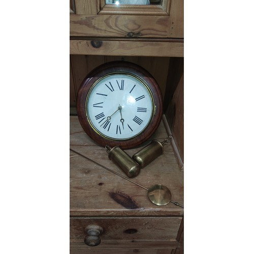 490 - An antique wood cased wall clock with two weights.