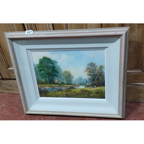 497 - A framed picture of a woodland scene, by artist Gordon Lindsay. 23.5 x 20.5 inch