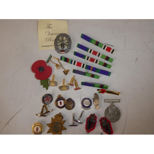 460 - A large collection of medals, badges, cufflinks and more of Northern Irish and British interest.