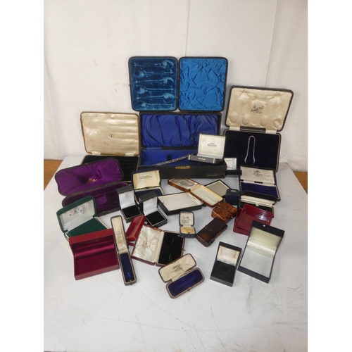 464 - A large collection of vintage jewellery boxes.