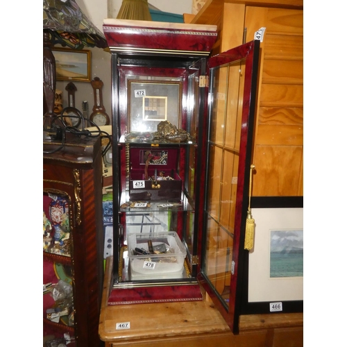 471 - An Oriental style table top display cabinet. 32.5 x 10.5 inch