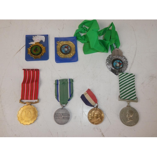 473 - A collection of vintage medals.