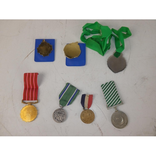 473 - A collection of vintage medals.