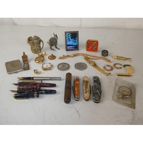 478 - An assortment of items to include pocket knives, pens, watches, silver plated items and more.