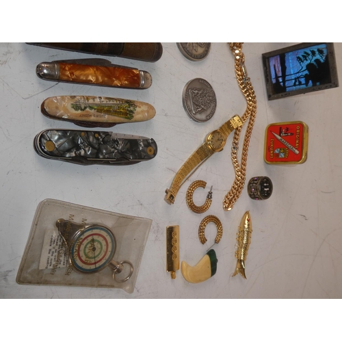 478 - An assortment of items to include pocket knives, pens, watches, silver plated items and more.