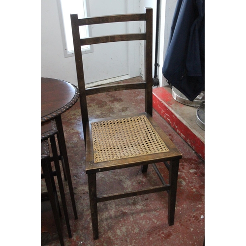 271B - A mahogany nest of three tables and an oak framed occasional chair.