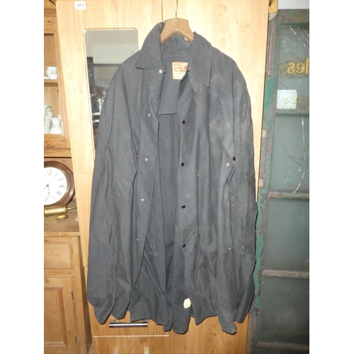 450 - A vintage RIC/ RUC George Mac Lellan and Co weather proof cloak, made in Scotland.