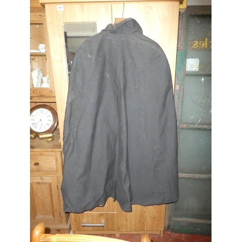 450 - A vintage RIC/ RUC George Mac Lellan and Co weather proof cloak, made in Scotland.