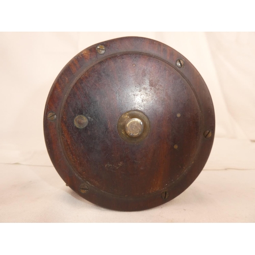 102 - An antique brass and rosewood fishing reel - R Lees, Perth.