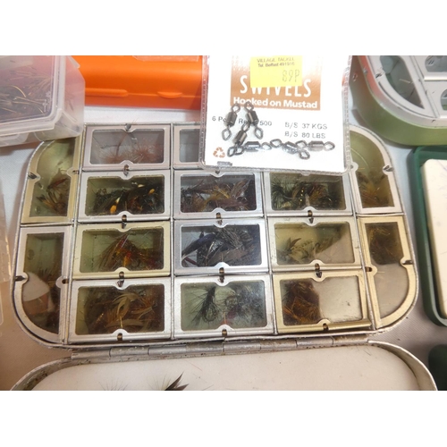 40 - A large collection of fishing accessories to include flies, cases, Hardy lines & more.