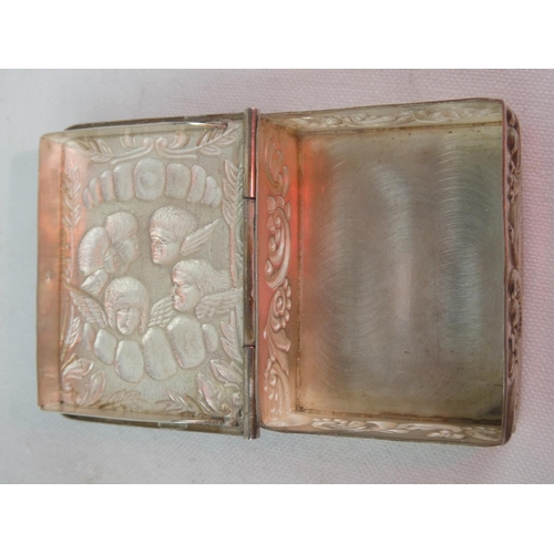 60 - A stunning antique sterling silver snuff box, with highly decorative cherub design, stamped Sterling... 