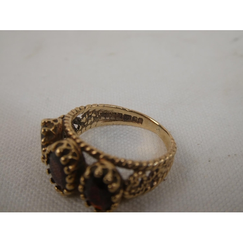 61 - 2 antique 9ct gold & garnet rings (1 missing stones), total weight 7.33g