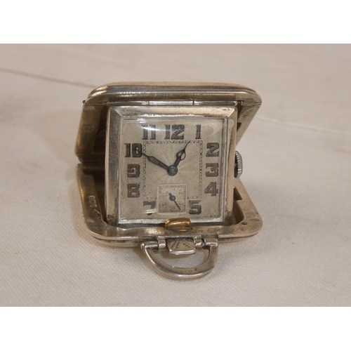 81 - A Sterling Silver watch in a travel case.